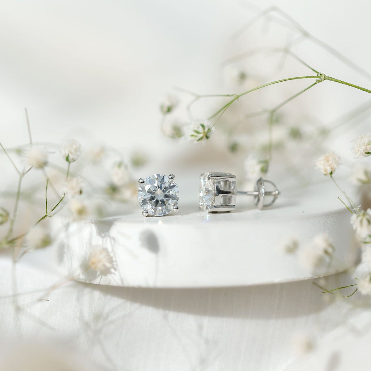 2.7 Carat Round Moissanite Studs in Claw Setting