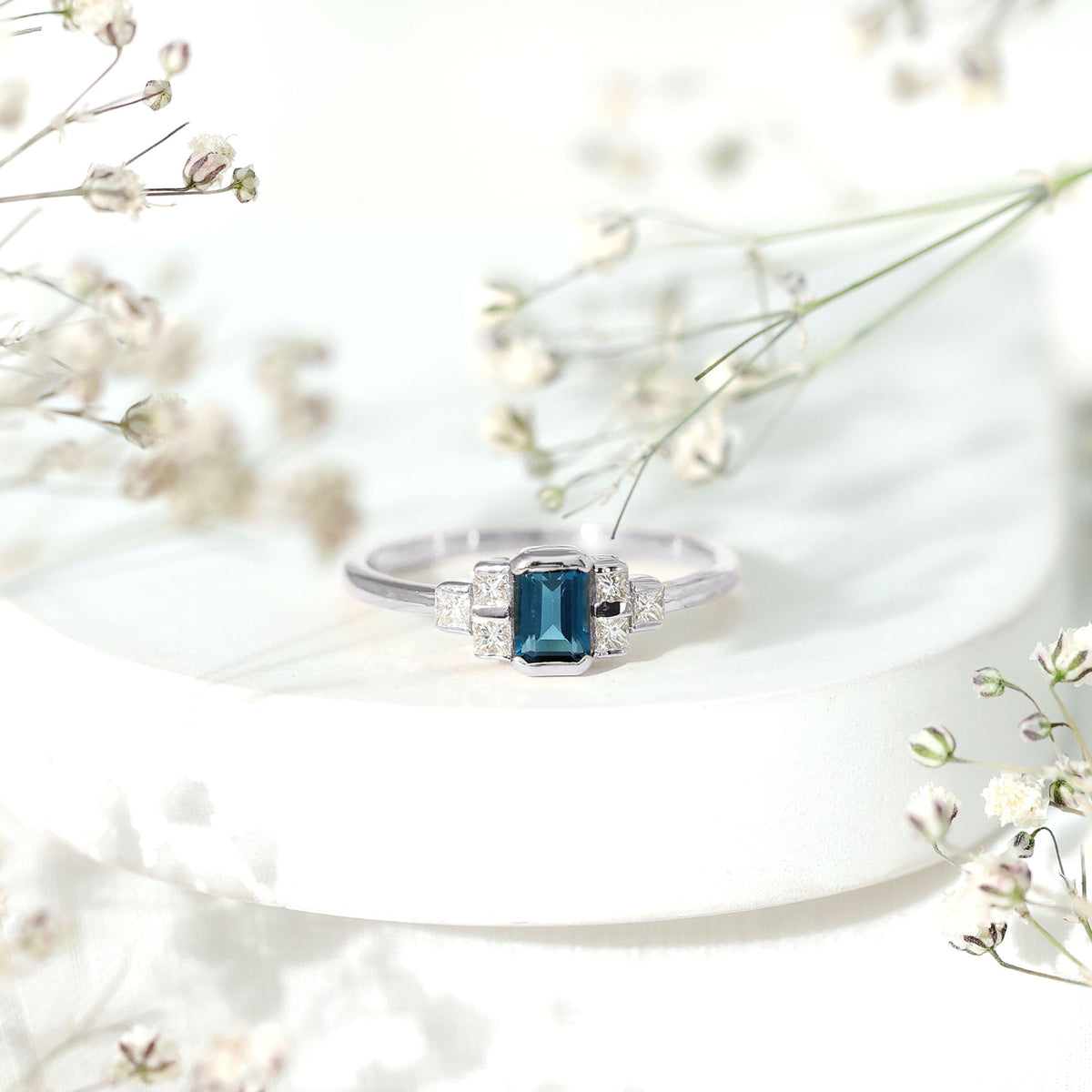 0.7 Carat Emerald Cut London Blue Topaz Statement Ring with Diamond