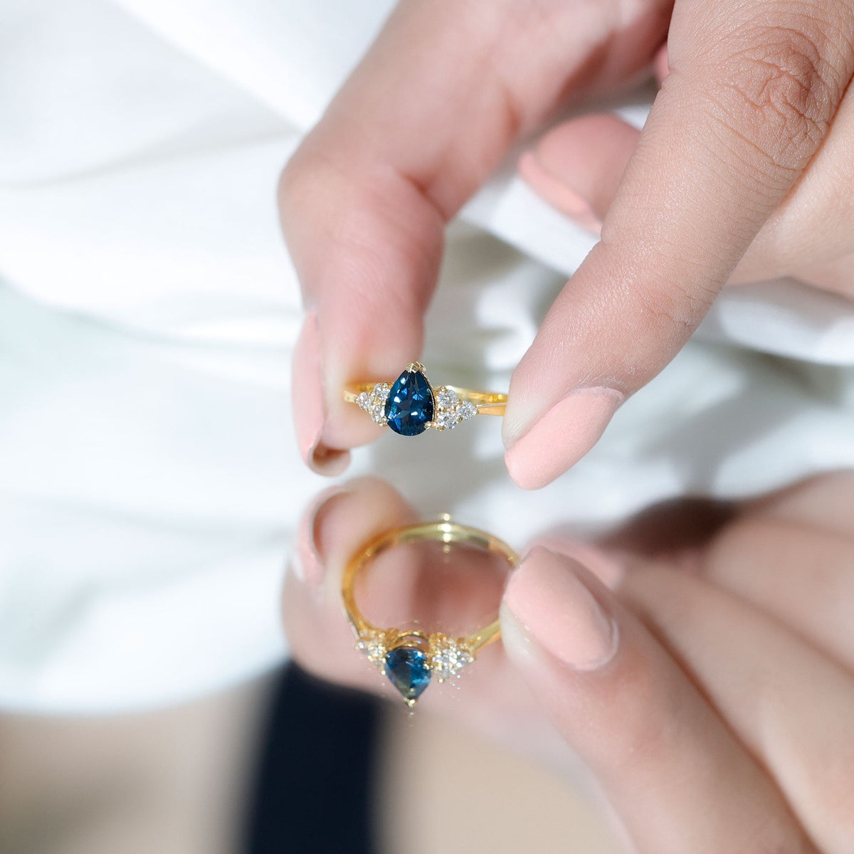 5X7mm Pear Shape London Blue Topaz Engagement Ring with Diamond Trio