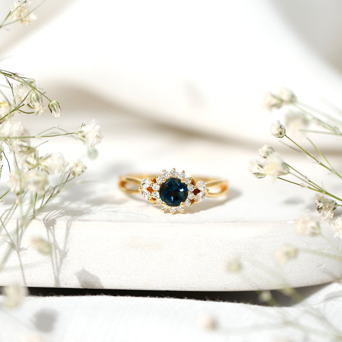 0.6 Carat London Blue Topaz Floral Engagement Ring with Diamond