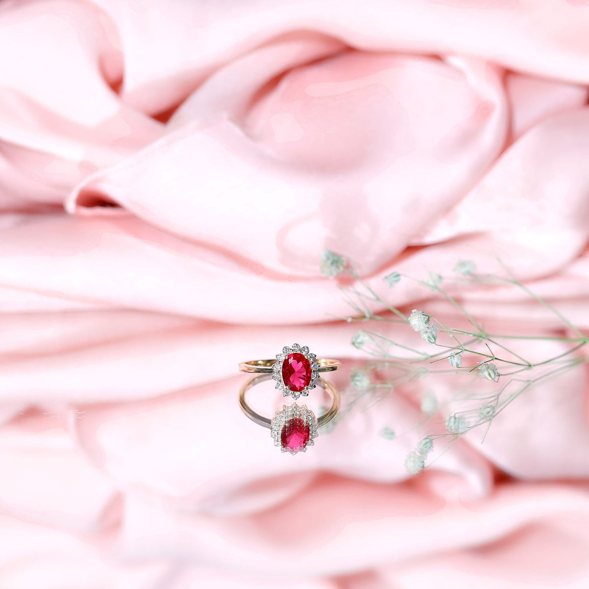 1.5 Carat Oval Shape Lab Grown Ruby and Diamond Halo Engagement Ring