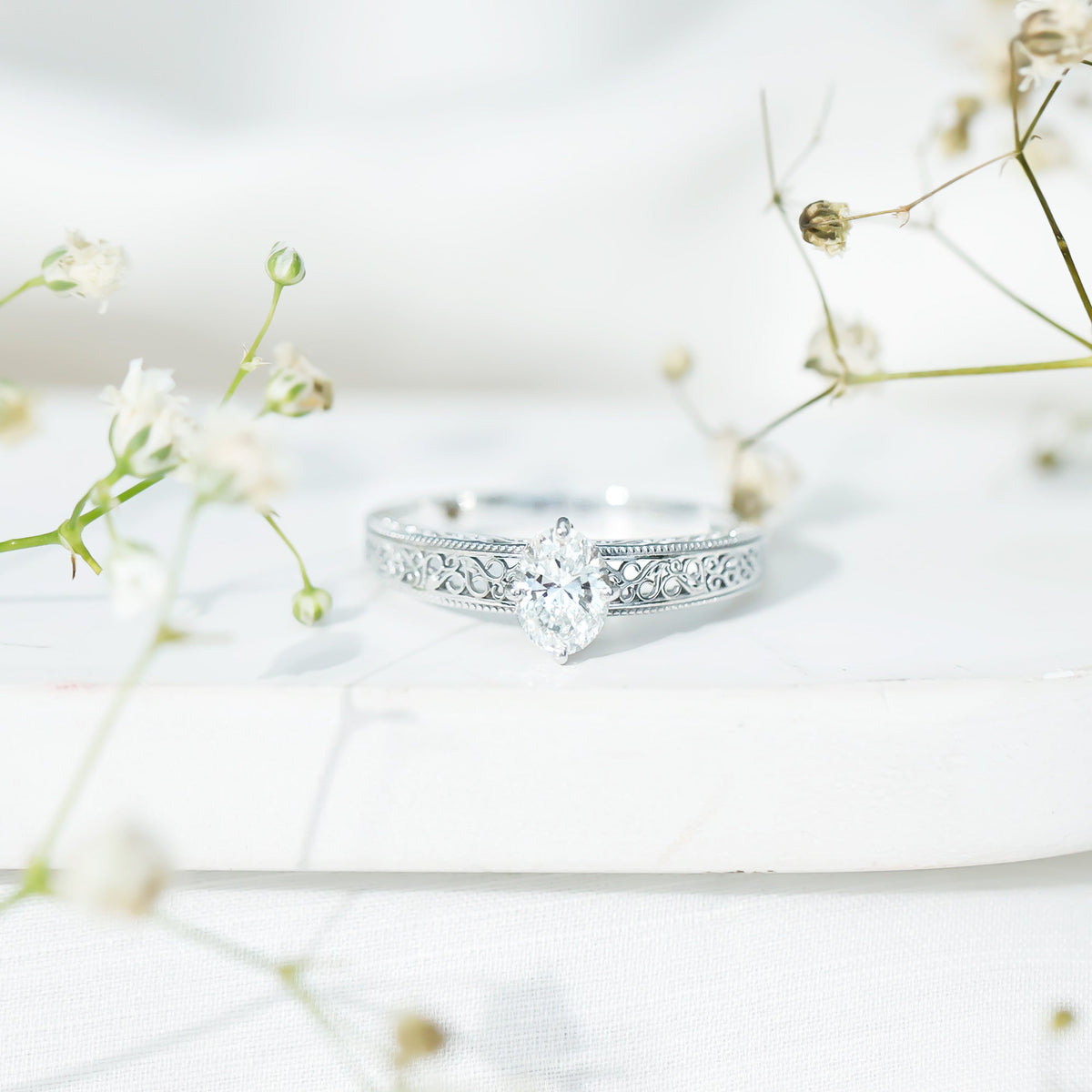 1.2 Carat Moissanite Oblong Engagement Ring with Filigree Shank