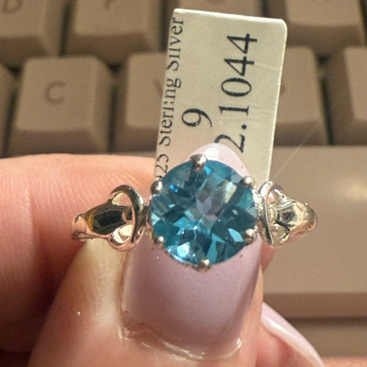 Sterling Silver Round Blue Topaz Ring with Scrollwork Detailing (Size 9)