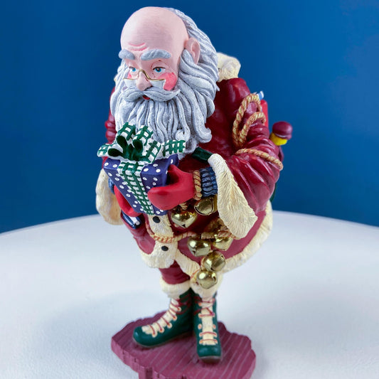 Vintage Jolly Old Elf with Gifts & Bells by Dept. 56. Santa Figurine. Christmas Decoration. Holiday Celebration. Retail or Home Decor.