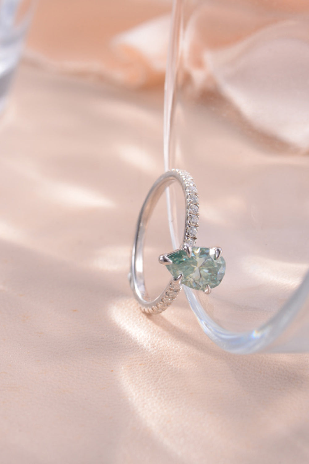 1.5 Carat Teardrop Shape Blue Pear-Cut Sparkala™ Platinum Over Pure Sterling Silver Ring