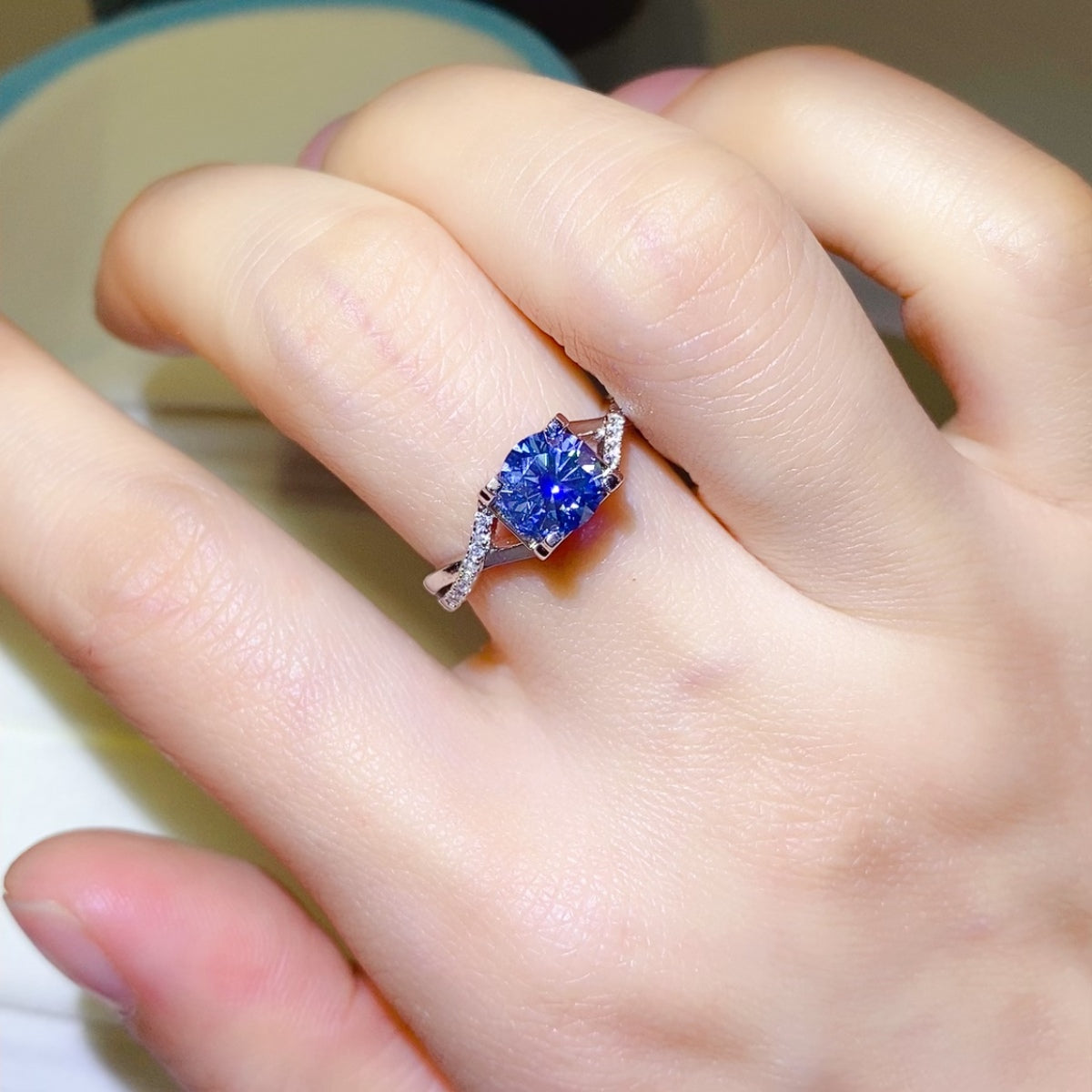 1 Carat Blue Brilliant Round Cut Sparkala™ Crisscross Pure Sterling Silver Ring