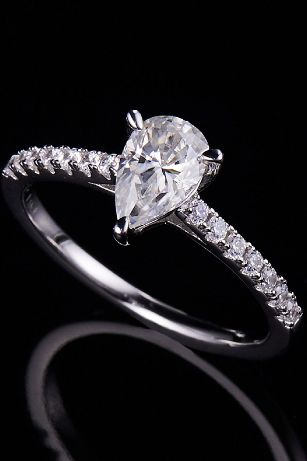 1 Carat Pear-Cut Sparkala™ Platinum Over Pure Sterling Silver Side Stone Ring