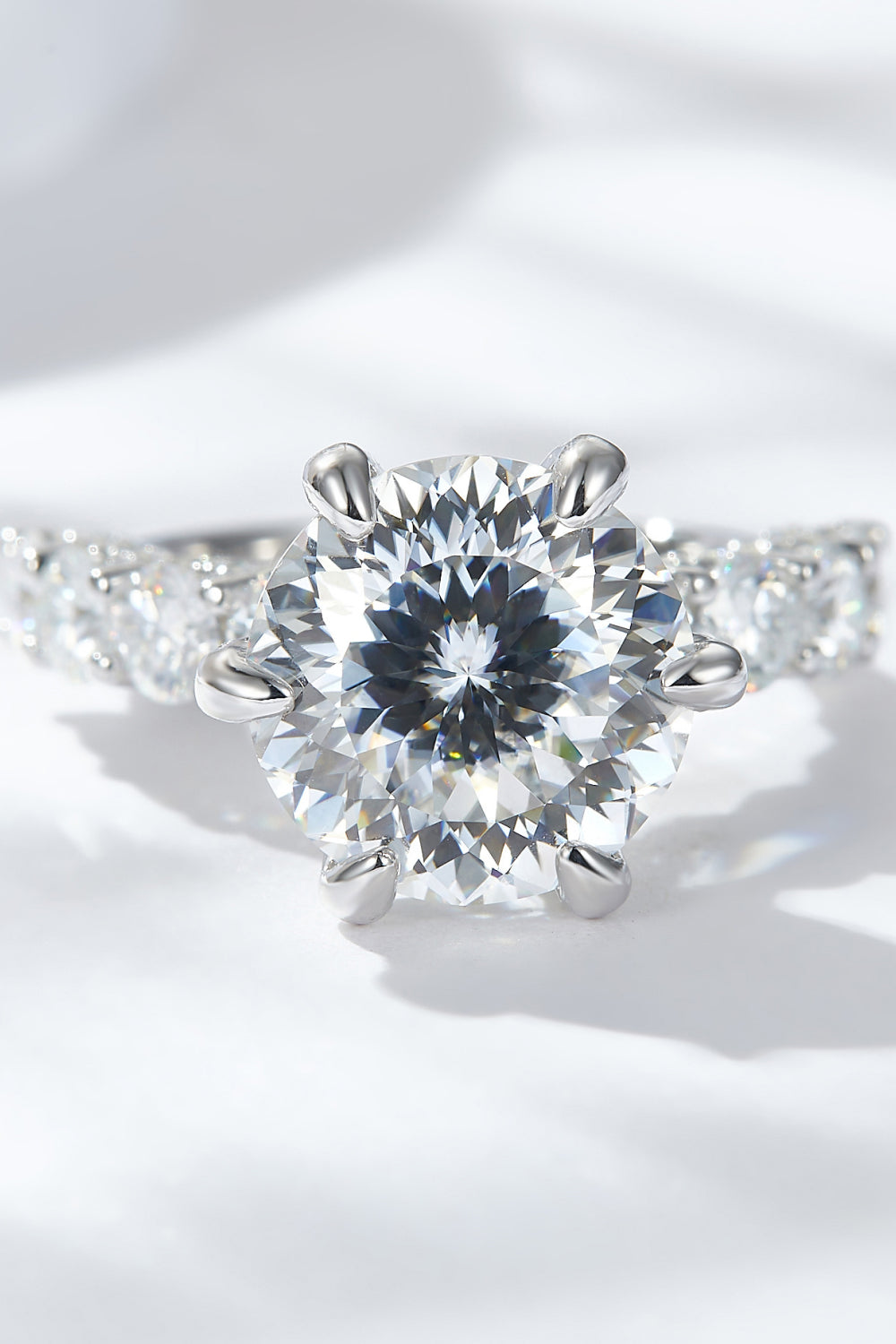 5 Carat Brilliant Round Cut Sparkala™ Solitaire with Side Stone Ring (Platinum Plated Pure Sterling Silver)