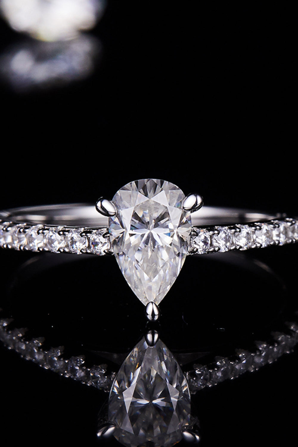 1 Carat Pear-Cut Sparkala™ Platinum Over Pure Sterling Silver Side Stone Ring