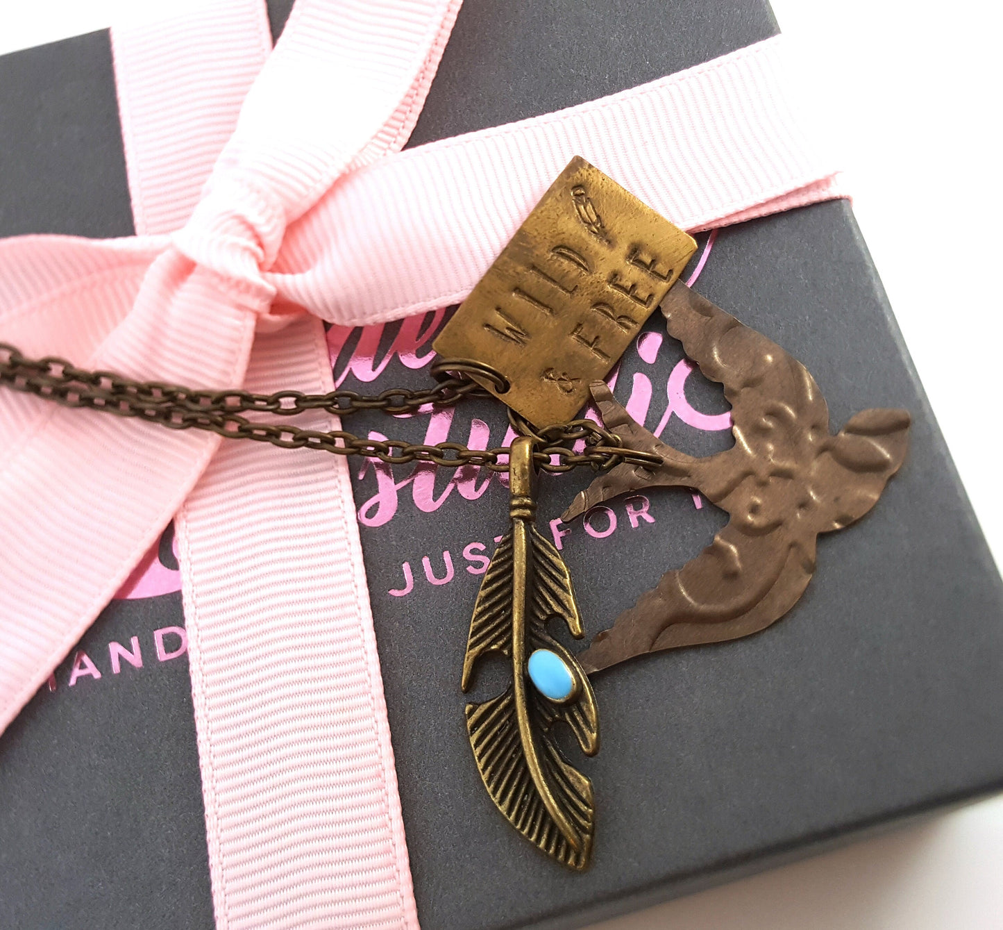 Wild and Free Charm Necklace – Brass Bird, Feather, and Handstamped Tag