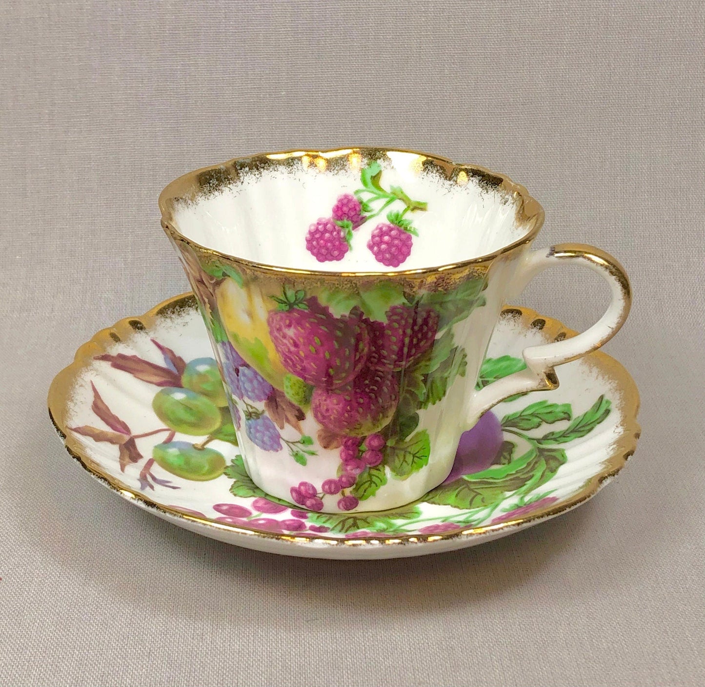 Vintage Metasco Tea Cup and Saucer. Made in Japan. Cherry Blossom Motif. Iridescent Background. Collectible Tea Set.