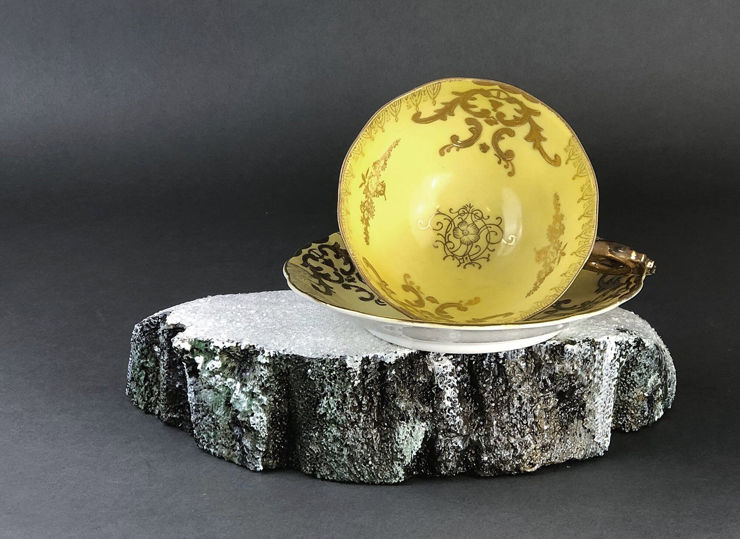 Antique Cup and Saucer Set by Royal Sealy China, Japan. Yellow Cup and Saucer with Rich Gold Decor and Iridescent Background Outside.