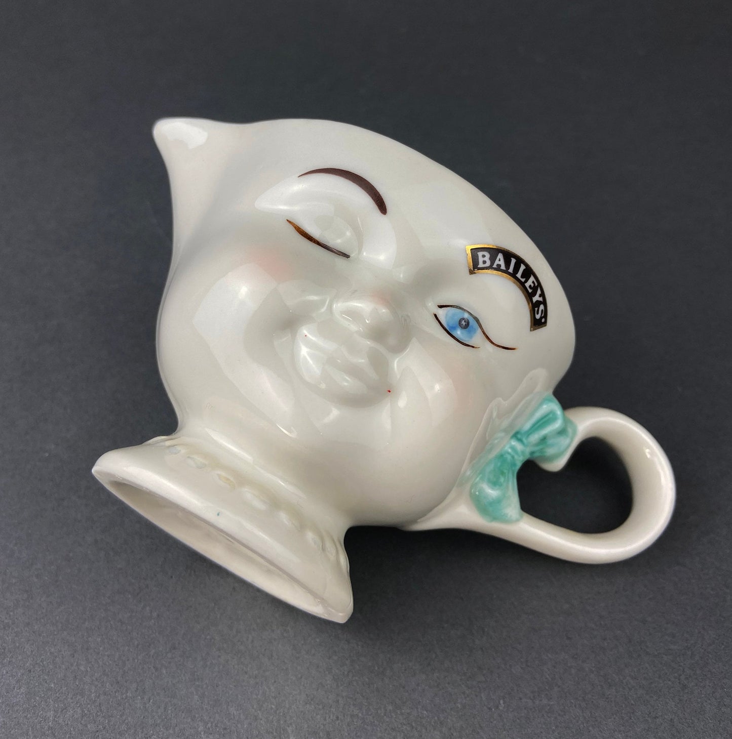 Bailey's Winking Face Creamer with Blue Bow.  Yum Collectible Creamer.  Limited Edition.