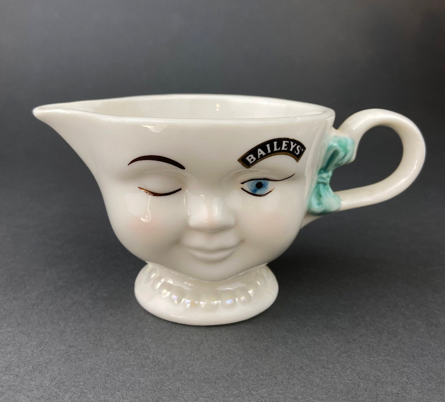 Bailey's Winking Face Creamer with Blue Bow.  Yum Collectible Creamer.  Limited Edition.