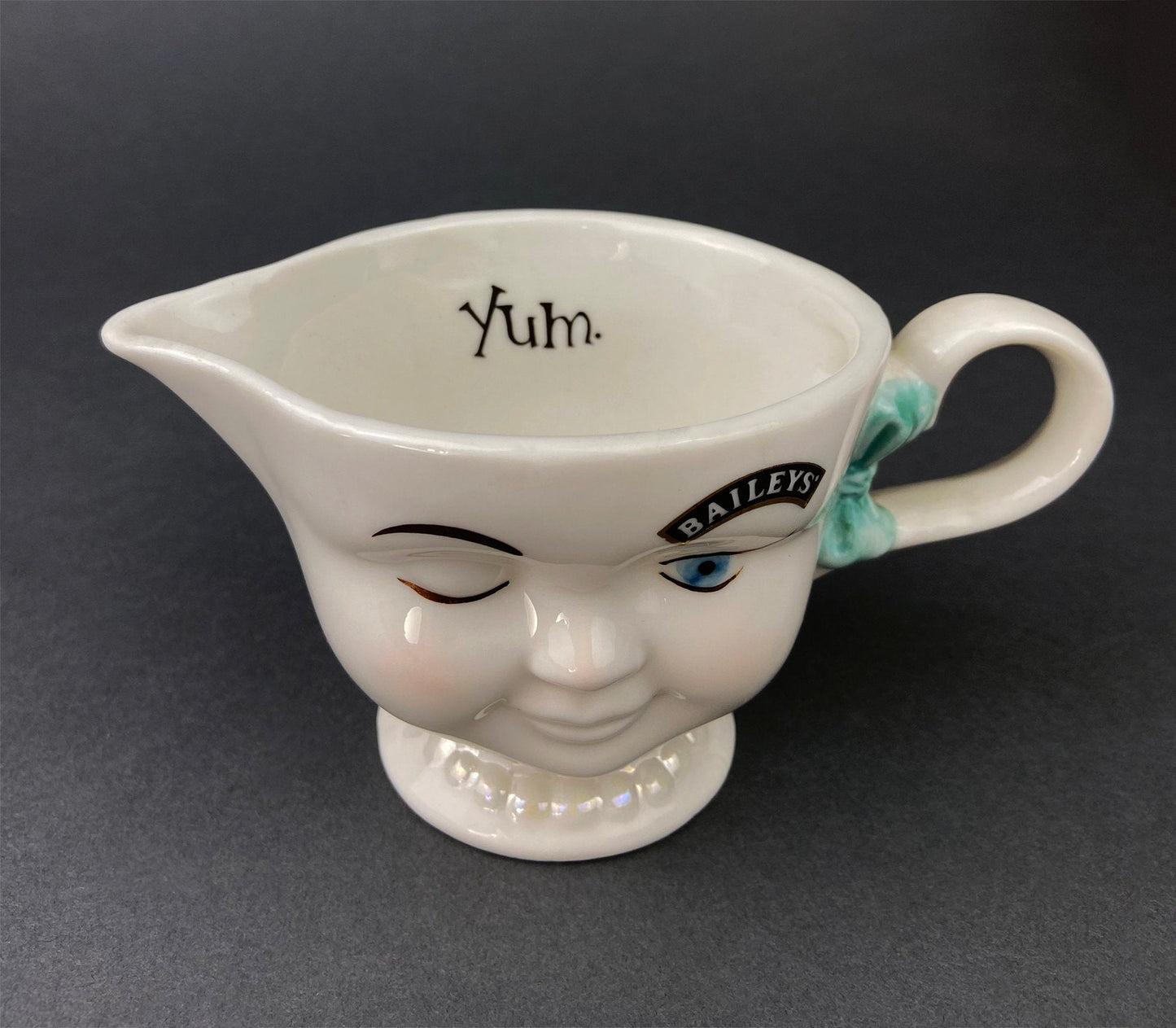 Bailey's Winking Face Creamer with Blue Bow.  Yum Collectible Creamer.  Limited Edition.