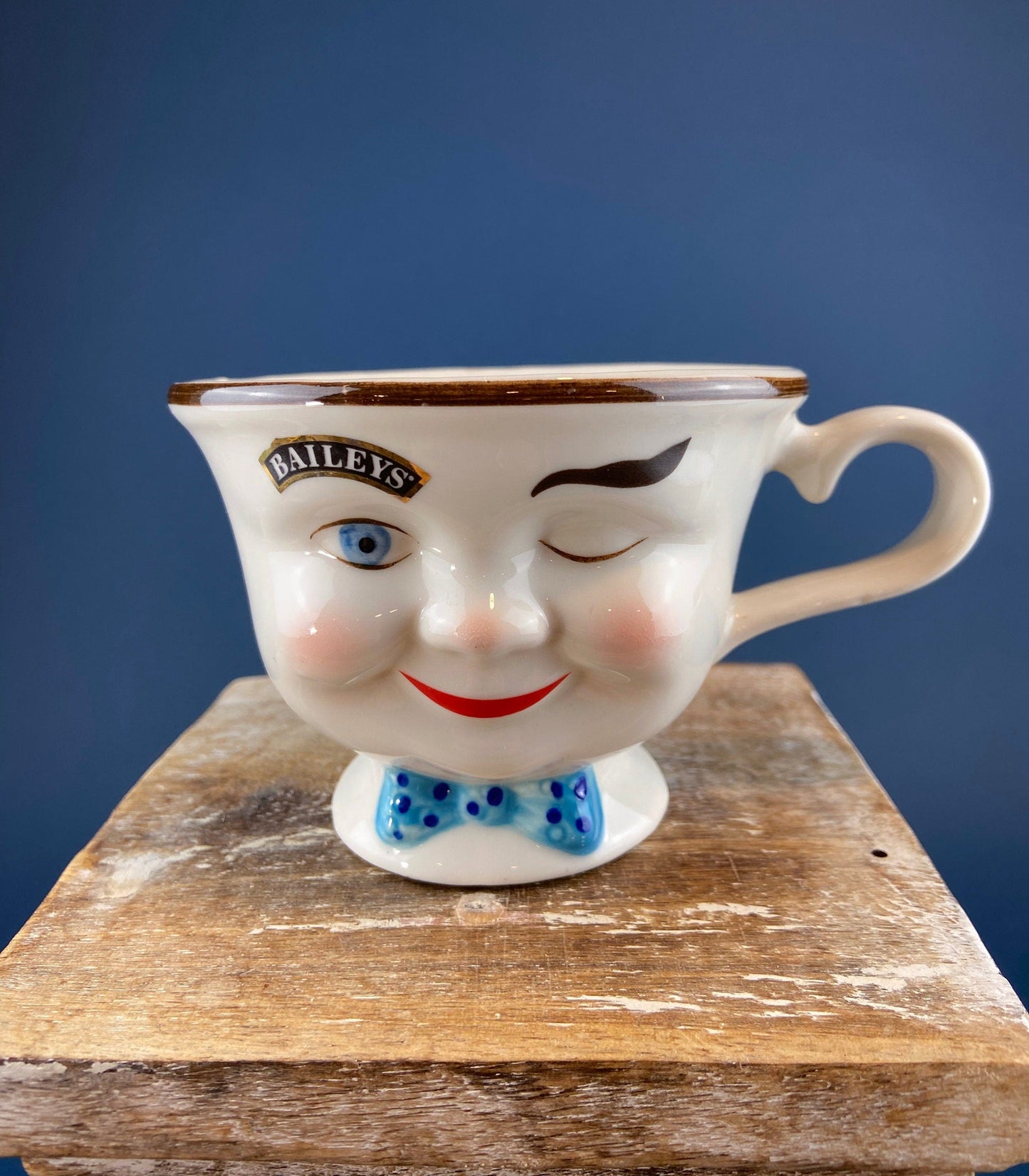 Bailey's Winking Face Creamer with Blue Bow.  Yum Collectible Creamer.  Limited Edition.