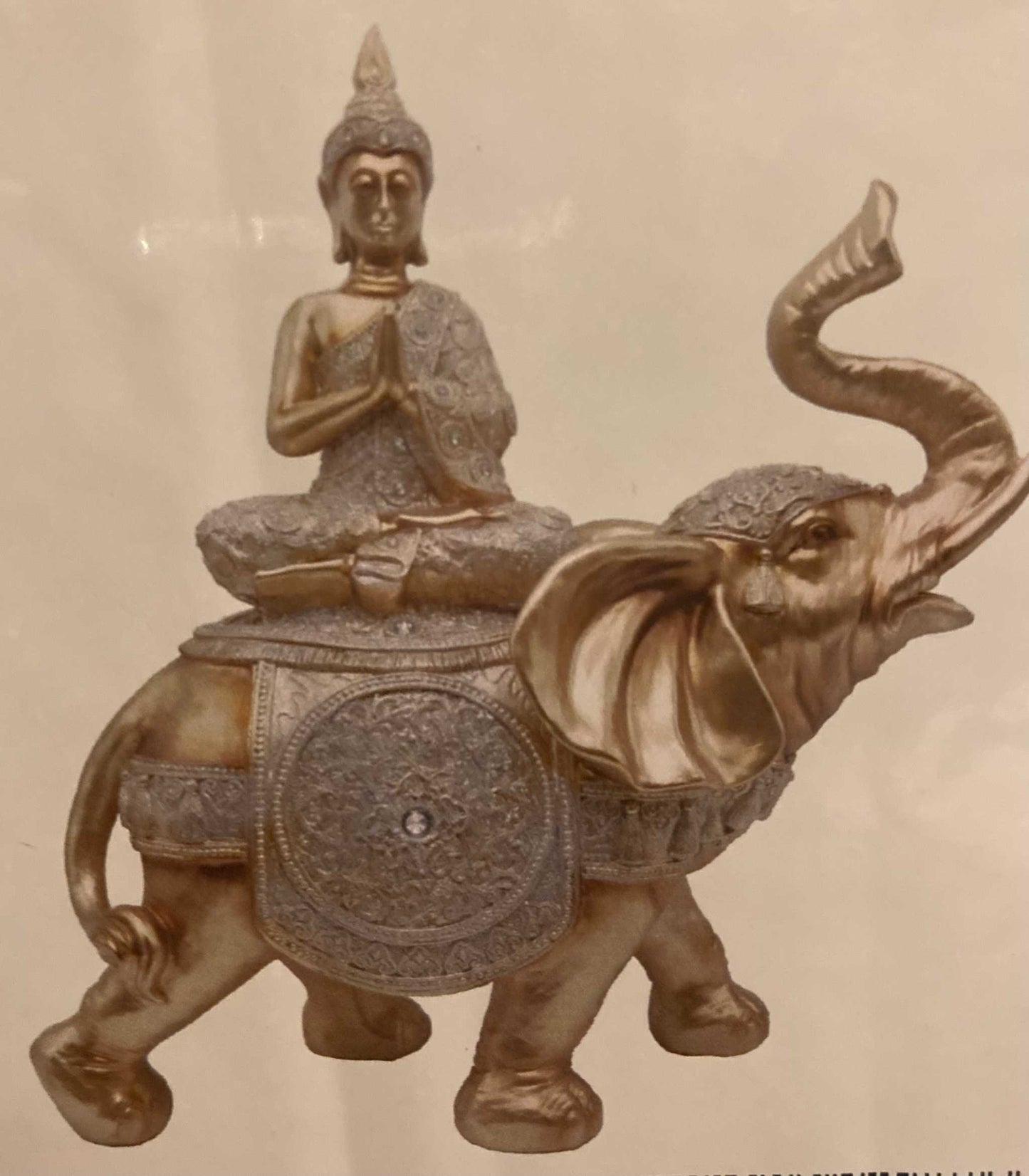 Gold Tibetan Buddha on Elephant