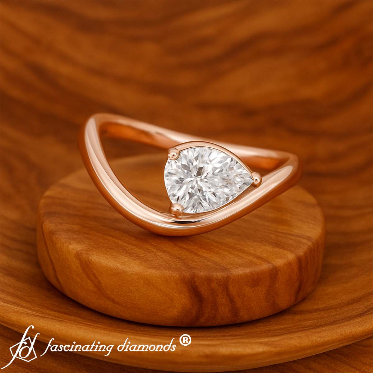Pear Shaped Curve Shank Solitaire Diamond Ring